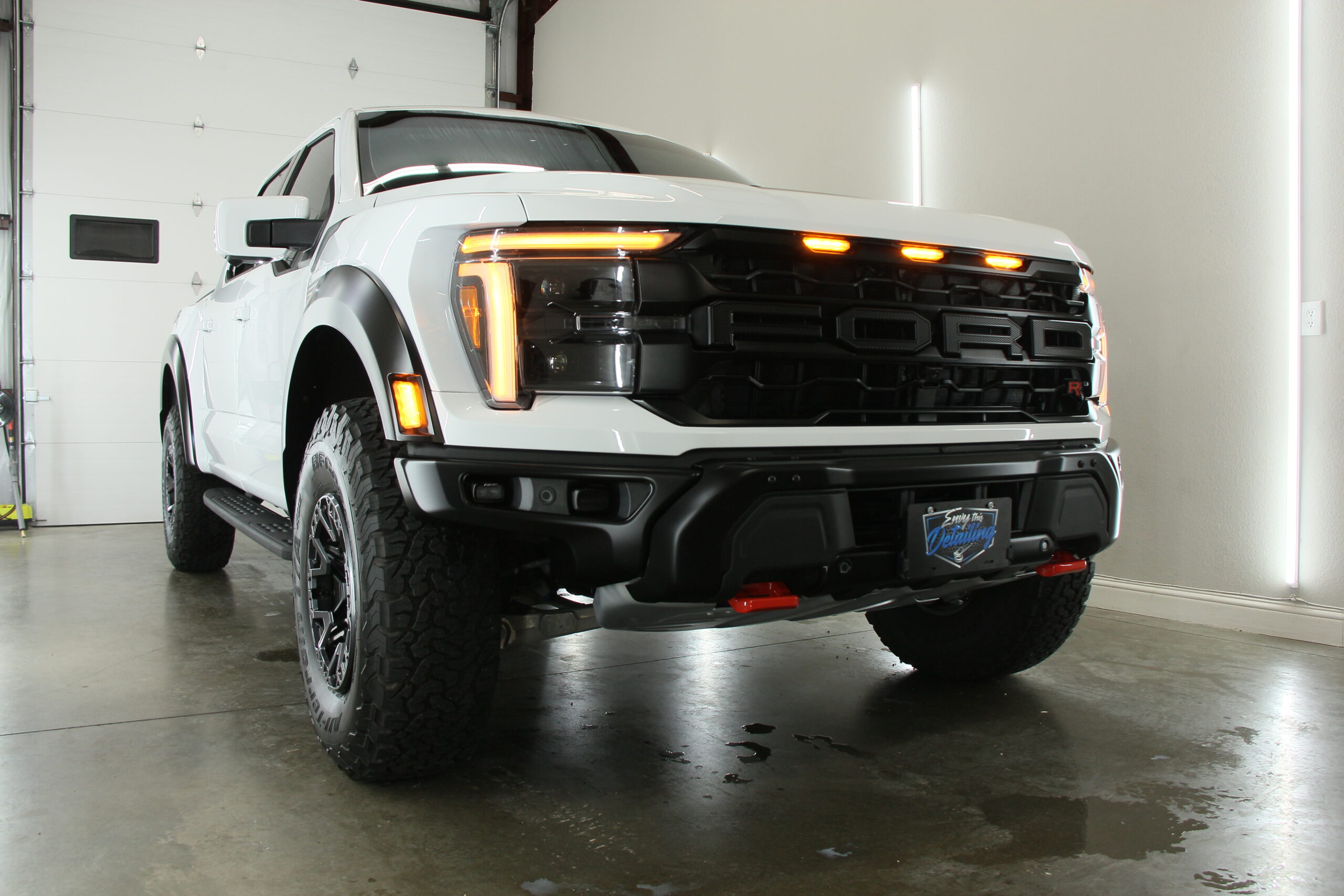 Ford Raptor R with a freshly applied ceramic coating at Envy This Detailing in College Station, TX, showcasing a rugged and glossy protective finish.