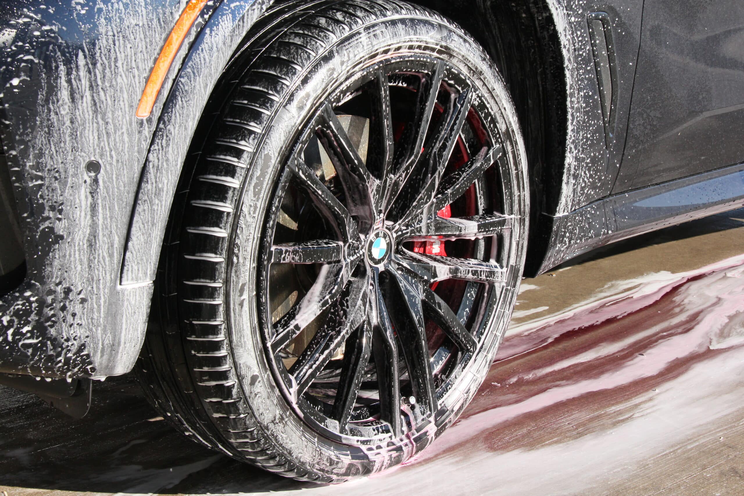 BMW X5 M Series receiving premium exterior auto detailing at Envy This Detailing in College Station, TX—paint polished to perfection with professional-grade products.