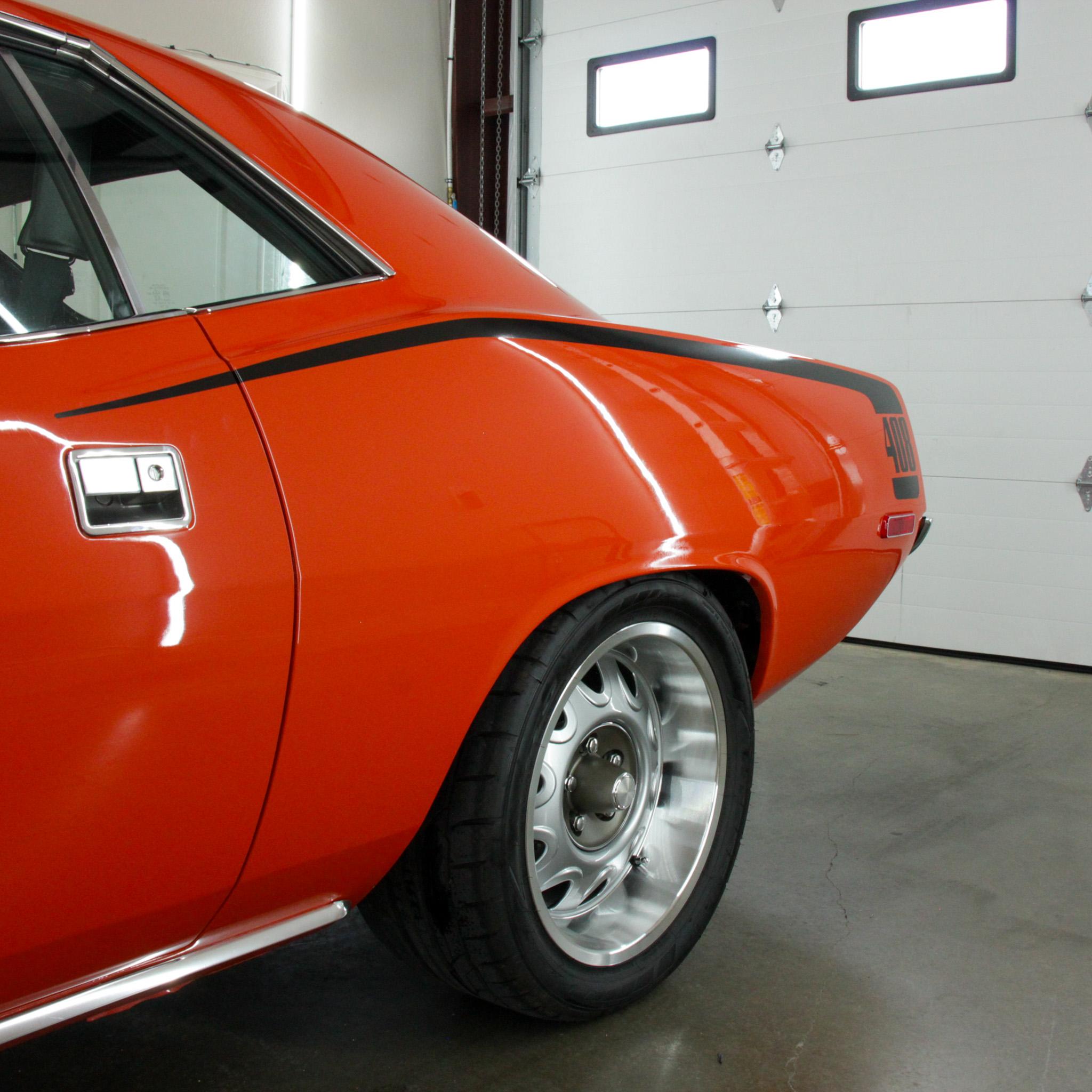 Vehicle showcasing the glossy finish and protective benefits of ceramic coating outdoors