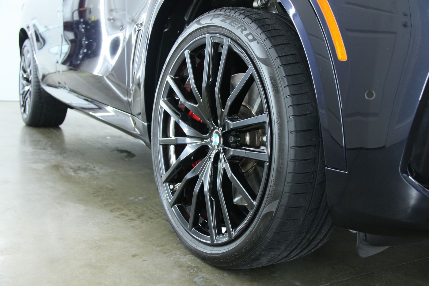 Auto Detailing BMW X5 Wheel After College Station TX Clean BMW X5 wheel and paint after a full auto detail in College Station, TX