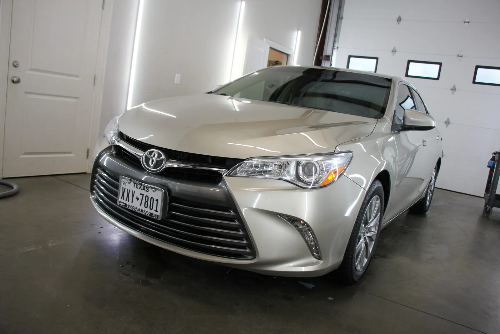 Ceramic window tint being installed on a Toyota Camry in College Station